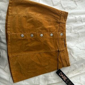 It is autumn vibe skirt. It is soft velvet material , new and never worn !